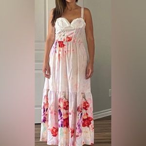 Brand new - never used dress . It is perfect for a garden party/ wedding /date